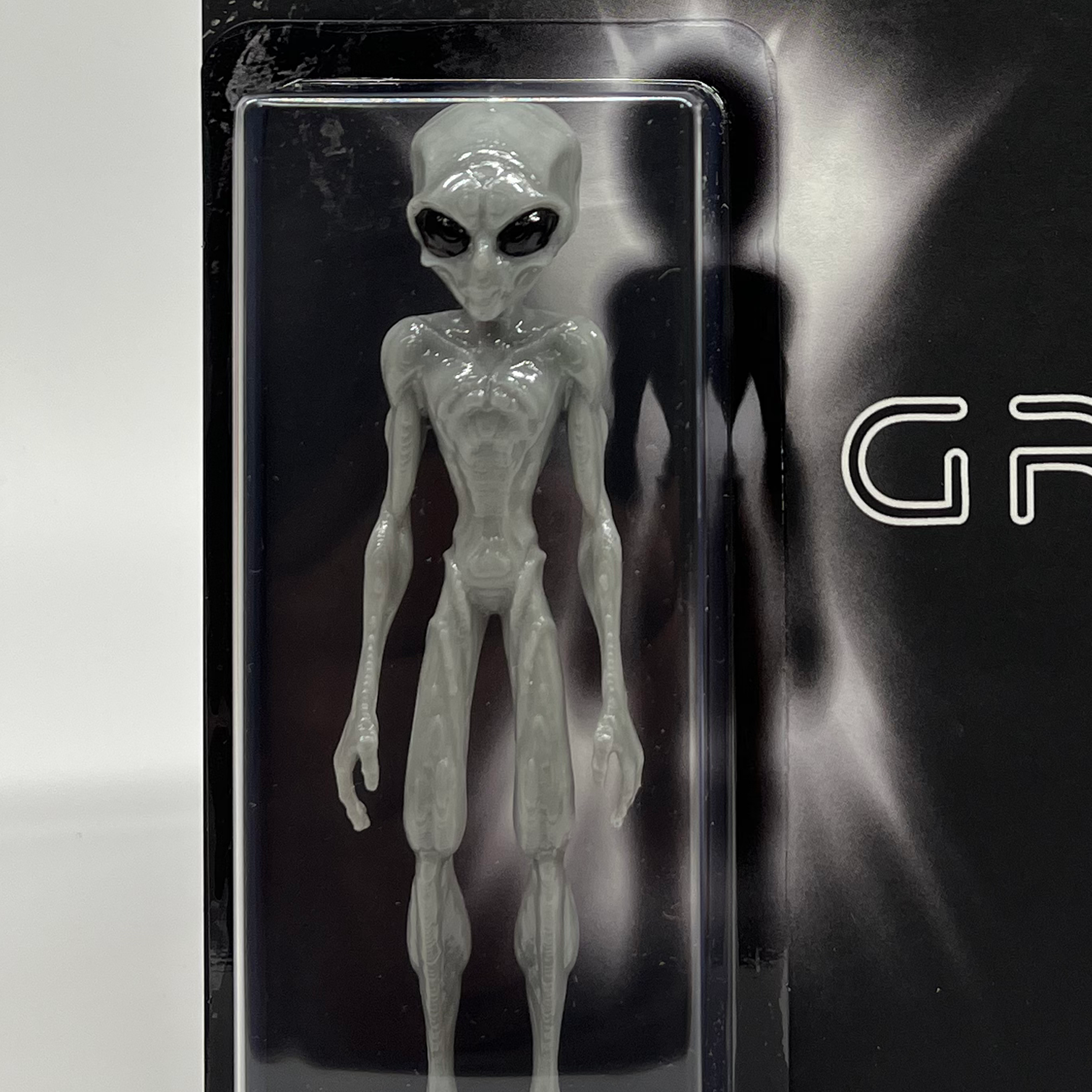 Grey Figure
